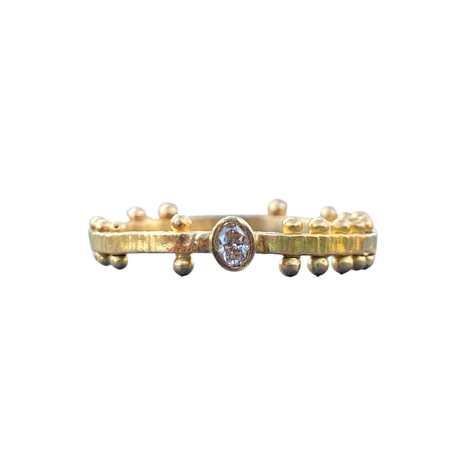 Scattered Dot Oval Diamond Solitaire Ring